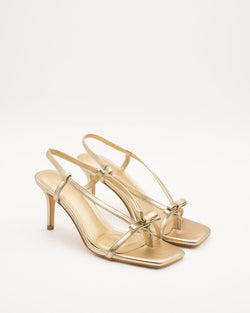 Ceremonial sandals with bow and thin straps