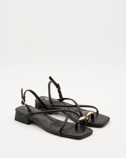 Sandals with cross-over straps and metal ring