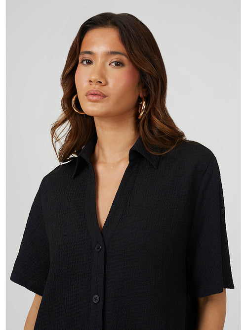 Black flowing short-sleeve shirt