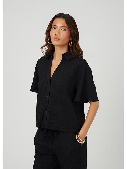 Black flowing short-sleeve shirt